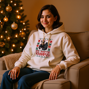 AFK – Away for Krampus Oversized Hoodie auf gemütlichem Boho-Sofa mit Weihnachtslichtern – Bright Light Arts, festlicher Gaming-Humor
