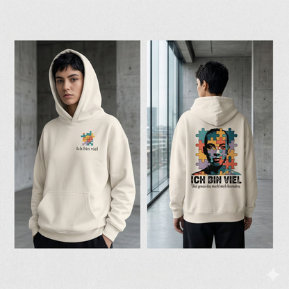 Frau im 380 GSM Bright Lights Arts Oversized Hoodie mit Puzzle-Brustprint und großem Rückendruck Ich bin viel.