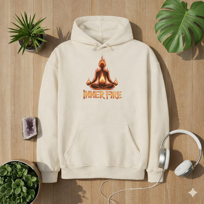 Natural Raw Oversized Hoodie mit „Inner Fire“ Design – meditierende Figur mit Flammenmotiv im Bright Lights Arts Lifestyle Mockup auf Holzuntergrund mit Pflanzen und Kopfhörern