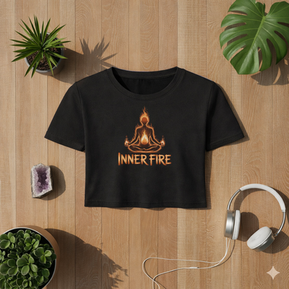 Schwarzes Ladies Cropped Tee mit Inner Fire Yoga Meditation Flammen Design im Bright Lights Arts Mockup auf Holz Hintergrund mit Pflanzen Kristall und Kopfhörern